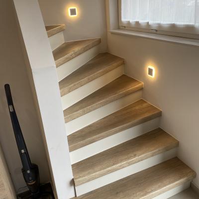 NACHHER - Treppe mit Steinstufen mit neuem Belag versehen lackiert